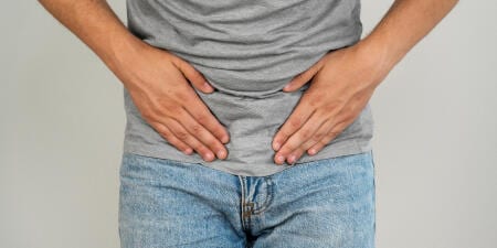 A male suffering from urinary incontinence.