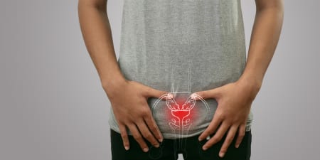 A man in pain due to localised cancer.