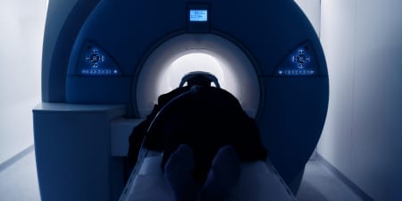 A patient undergoing MRI scan for penile cancer diagnosis.