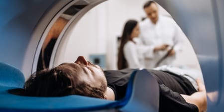 A patient undergoing MRI urography.