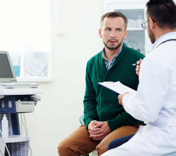 An urologist in online discussion for Prostate Cancer treatment.