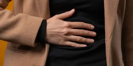 A man in pain due to bladder obstruction.