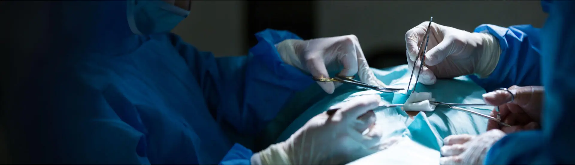 A team of urologists performing a TURP surgery.